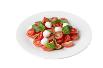 Salad with tomatoes, mozzarella and basil on a gray background