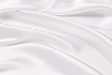 Abstract white fabric texture background. Cloth soft wave. Creases of satin, silk, and cotton.