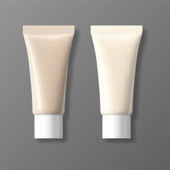 Blank foundation tubes in ivory and beige colors on white background
