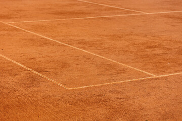 tennis court made of red clay soil with markings for game or competition. sports and recreation,...