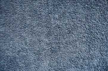 Terry towel texture. Close-up navy blue material structure, may be used as background.