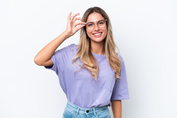 Young Uruguayan woman isolated on white background showing ok sign with fingers