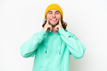 Young handsome man isolated on white chroma background smiling with a happy and pleasant expression
