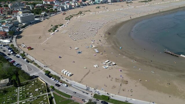Italian beach in early summer with bathers and the sea.
Aerial view