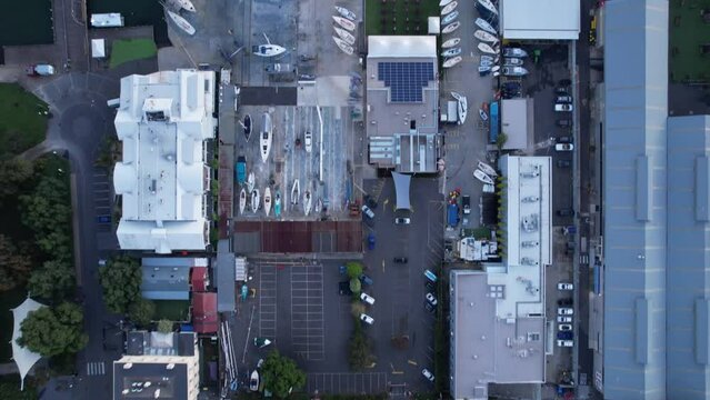Top down aerial view over the Marina in Williamstown with boats aligned on dock