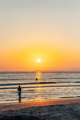 Peniche beach sunset in summer, Portugal. Golden hour. Holiday destination