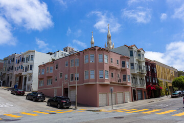 San Francisco, California, USA, June 29, 2022: San Francisco Victorian houses near Washington Square.