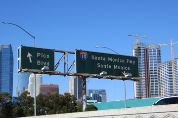 Los Angeles, California, USA, June 20, 2022: LA Traffic sign, 110 Freeway, Santa Monica Fwy and Santa Monica direction, freeway sign on Interstate 110. Direction to Pico Blvd.