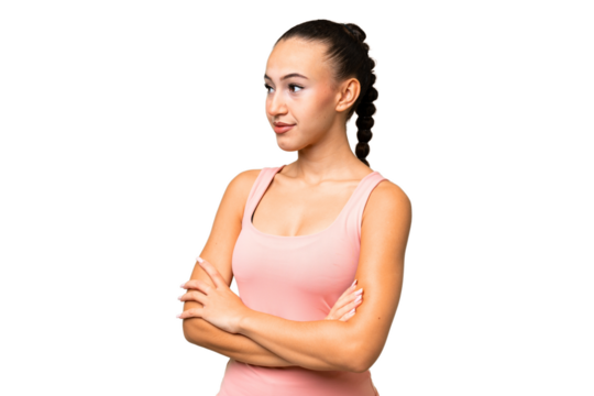 Young Arab woman over isolated background looking to the side