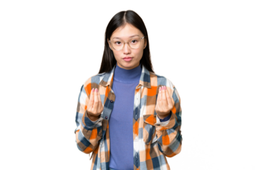 Young Asian woman over isolated chroma key background making money gesture but is ruined