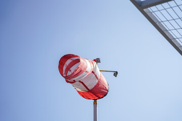wind sock on sky near helipad