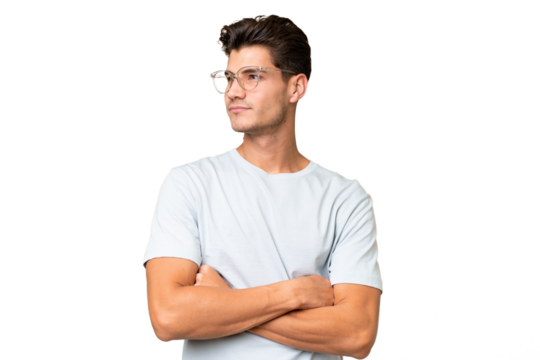 Young caucasian handsome man over isolated background looking to the side