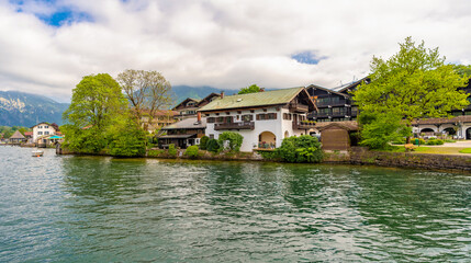 Fototapeta na wymiar Lake Tegernsee in southern Germany, Bavaria. View of the buildings on the lake