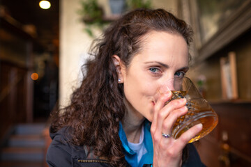 Woman enjoying bourbon