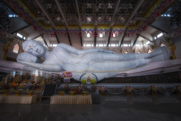The biggest white marble nirvana buddha  at Wat Pa Phu Kon, Udon Thani Thailand. - obrazy, fototapety, plakaty