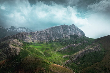 Bolkar General view during spring, green grass and snowy peaks, mountain range in central anatolia