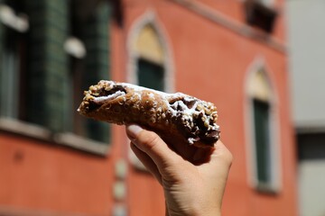 Sicilian cannolo pastry filled with chocolate