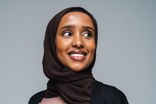 Beautiful arab middle-eastern woman with traditional abaya in studio