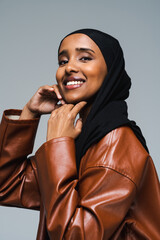 Beautiful arab middle-eastern woman with traditional abaya in studio