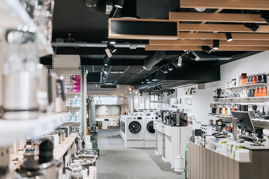 Interior of electronics store with various appliances arranged for sale