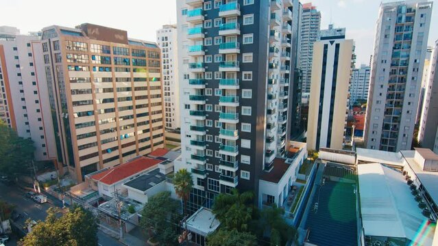 Tall residencial buildings in the city of Sao Paulo during sunny day, Vila Olimpia neighborhood, Brazil