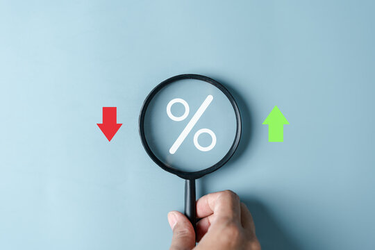 Magnifier focus to percentage icon inside for Increasing and decreasing, Up and Down arrow Currency money trading exchange transfer rate.