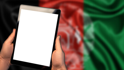 Naklejka premium Man hold tablet phone pc gadget with white blank screen, copy space for text, image or message. Flag of Afghanistan country on background. Technology, information, business