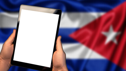 Man hold tablet phone pc gadget with white blank screen, copy space for text, image or message. Flag of Cuba country on background. Technology, information, business
