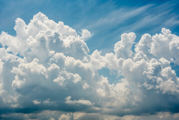 cumulus and cumulonimbus clouds, huge clouds that look like cotton in a blue sky