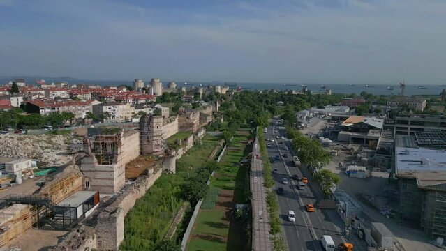 Fortress wall and towers of the ancient castle of Constantinople in Istanbul Türkiye  Aerial flying drone video