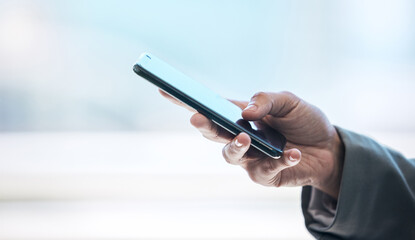 Phone, hand and networking with a business person typing a text message or email on a blurred background. Mobile, contact and communication with an employee browsing social media or texting closeup