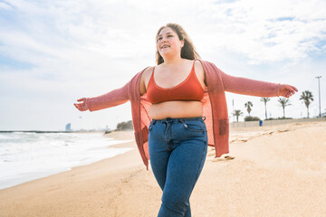 Beautiful plus size young woman outdoors - Curvy adult female, concepts about body positive,...