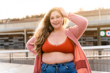 Beautiful plus size young woman outdoors - Curvy adult female, concepts about body positive,...