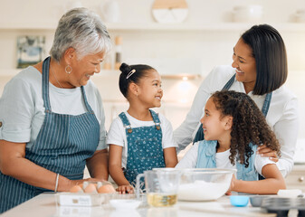 Grandmother, mom or happy kids baking in kitchen in a family home with siblings learning cooking skills. Cake, woman laughing or grandma smiling, talking or teaching young children to bake together