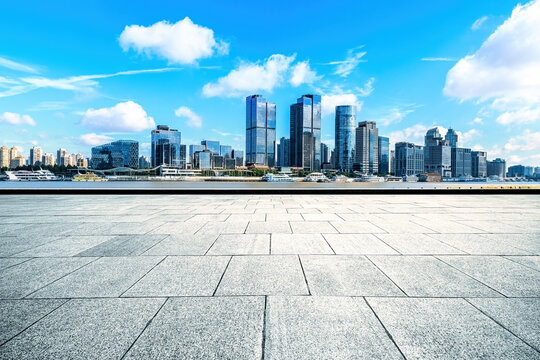 Clean square pavement and city skyline in Shanghai