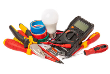 Electrician equipment isolated on white background, with copy space.Electrician tool set.Multimeter, tester,screwdrivers,cutters,duct tape,lamps,tape measure and wires.Flet lay. © Avocado_studio