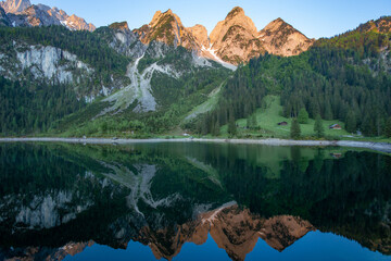 Dawn on the Alpine lake.