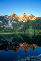 Fototapeta na wymiar Dawn on the Alpine lake.
