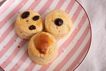 Homemade  Scones on plate. Scones is English pastry for afternoon tea.