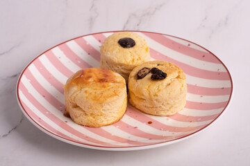 Homemade  Scones on plate. Scones is English pastry for afternoon tea.