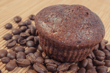 Fresh muffins with chocolate and coffee. Delicious dessert for different occasions