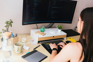 Homebound Developer: Young Woman Thriving in her At-Home Programming Hub