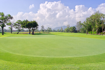 Naklejka premium beautiful golf course view, Golf Course with beautiful putting green, Fresh green grass on the golf course