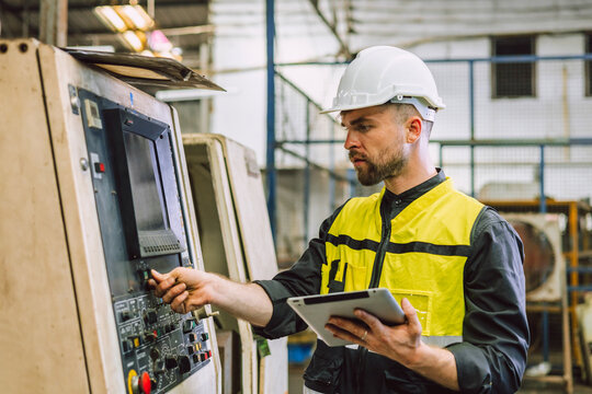 engineer worker using digital tablet for checking in factory