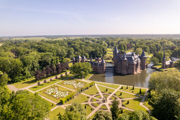 Bright view from above aerial showing historic picturesque castle Ter Haar in Utrecht with typical...