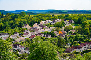 Aerial view of a lush residential neighborhood of new individual homes in Provins, a medieval city...