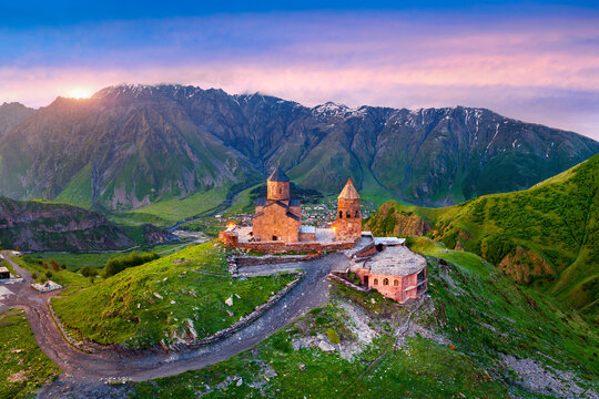 Aerial view of Gergeti trinity church at sunrise in Georgia.