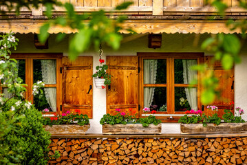 Window with wooden shutters of an old Bavarian house