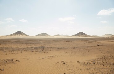 Fototapeta na wymiar The Otherworldly Black Desert in Western Egypt