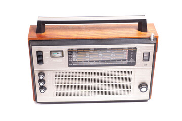 Old transistor radio isolated on white